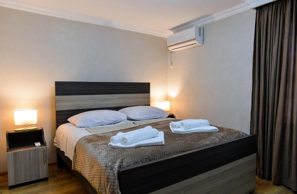 Postel nebo postele na pokoji v ubytování Cozy House