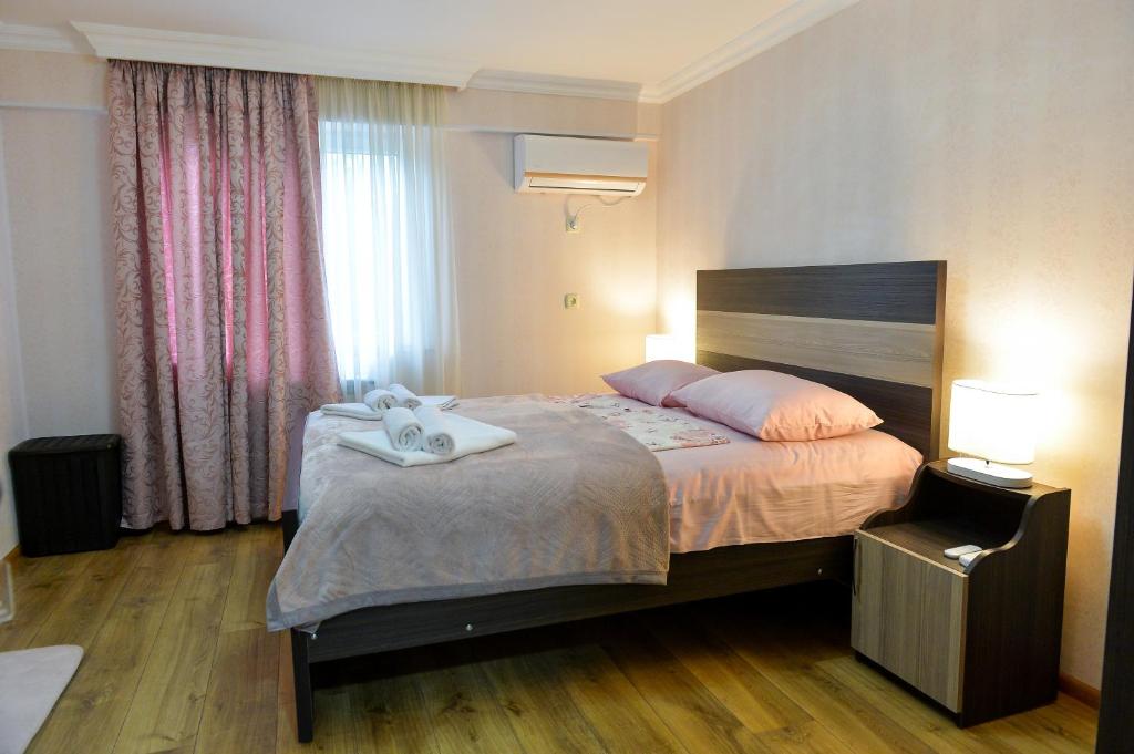 Postel nebo postele na pokoji v ubytování Cozy House