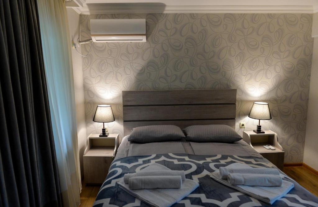 Postel nebo postele na pokoji v ubytování Cozy House