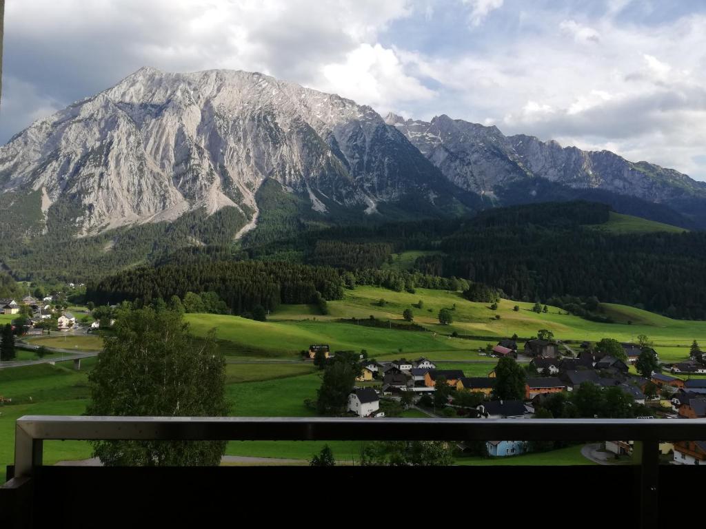 a view of a mountain with a town and a mountain at Appartement Bergblick in Tauplitz