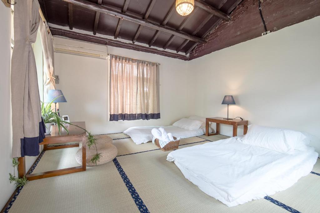 Letto o letti in una camera di ZYIN Homestay