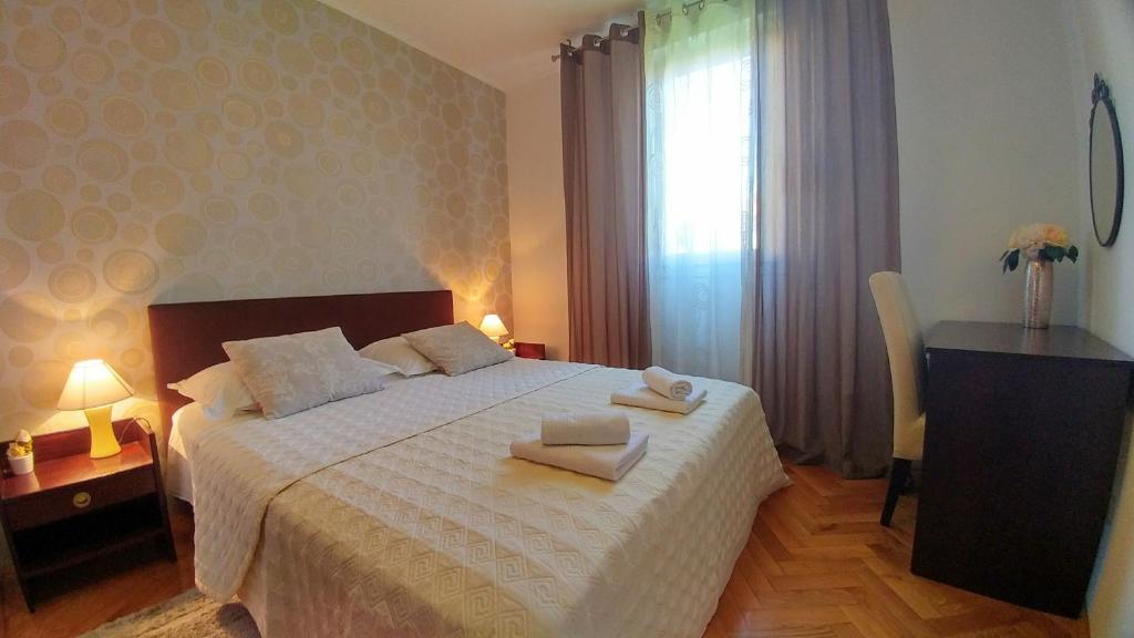 Posteľ alebo postele v izbe v ubytovaní Apartment Deluxe Sea View Split