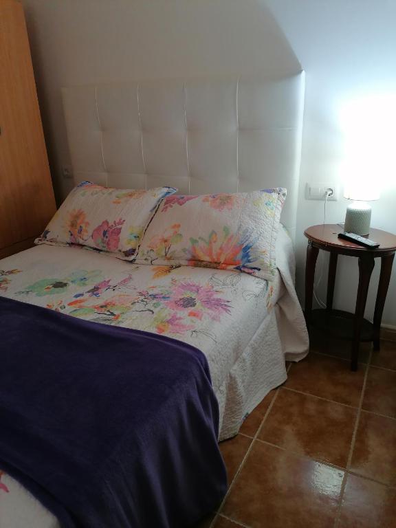 Postel nebo postele na pokoji v ubytování APARTAMENTO CAMPO SANTA BAIA