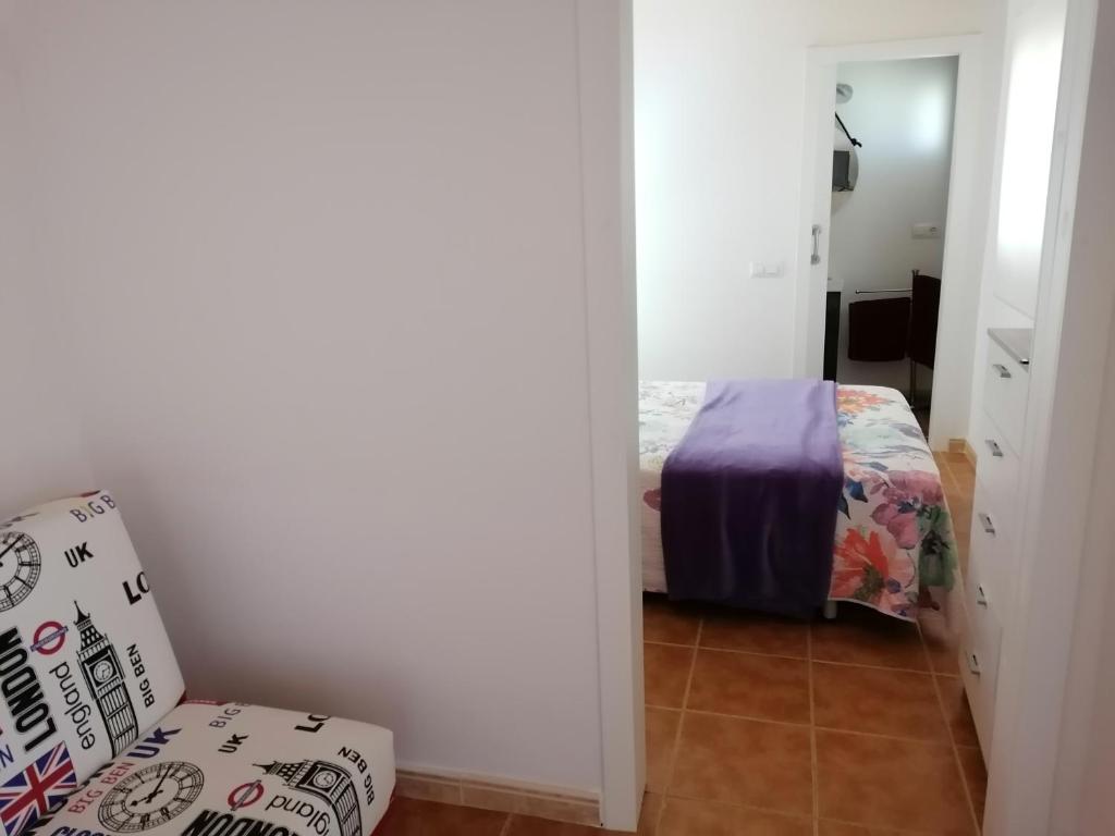 Postel nebo postele na pokoji v ubytování APARTAMENTO CAMPO SANTA BAIA