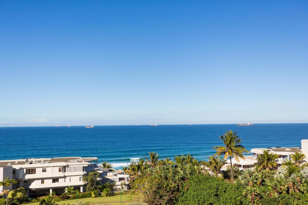 a view of the ocean from a resort at 43 Sea Lodge - by Stay in Umhlanga in Durban