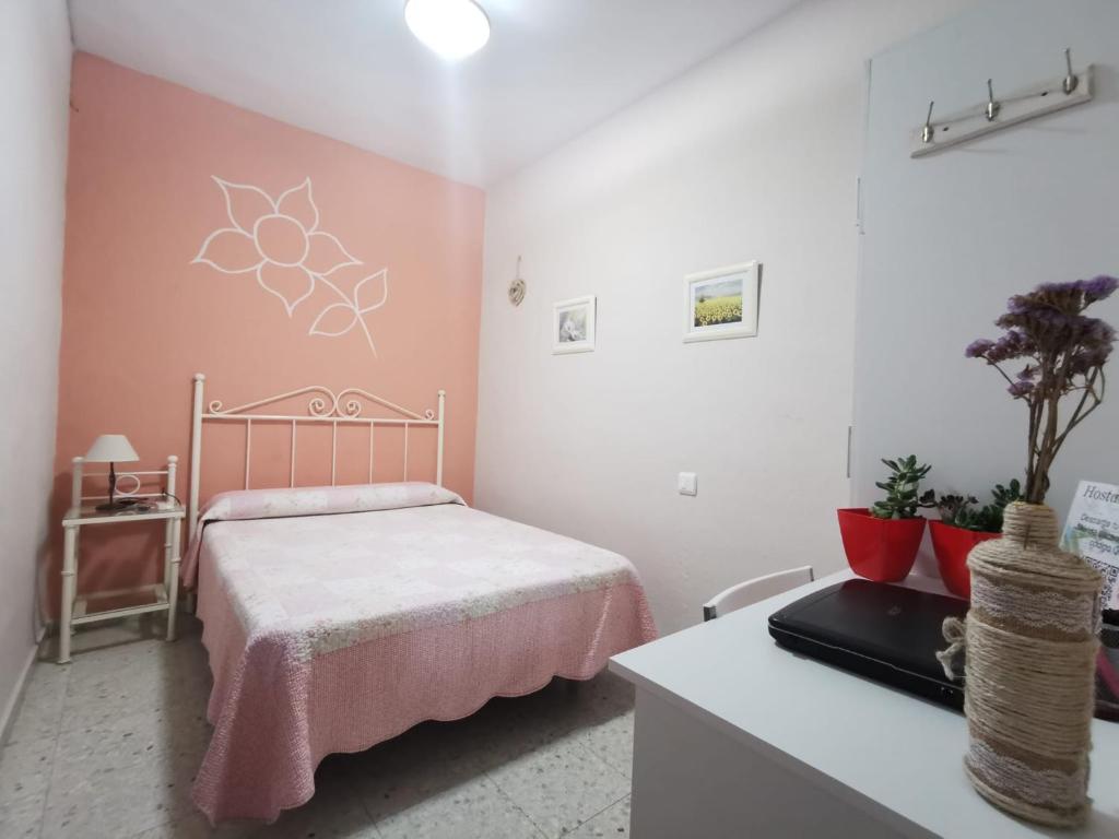 Cama o camas de una habitación en Hostal Senero