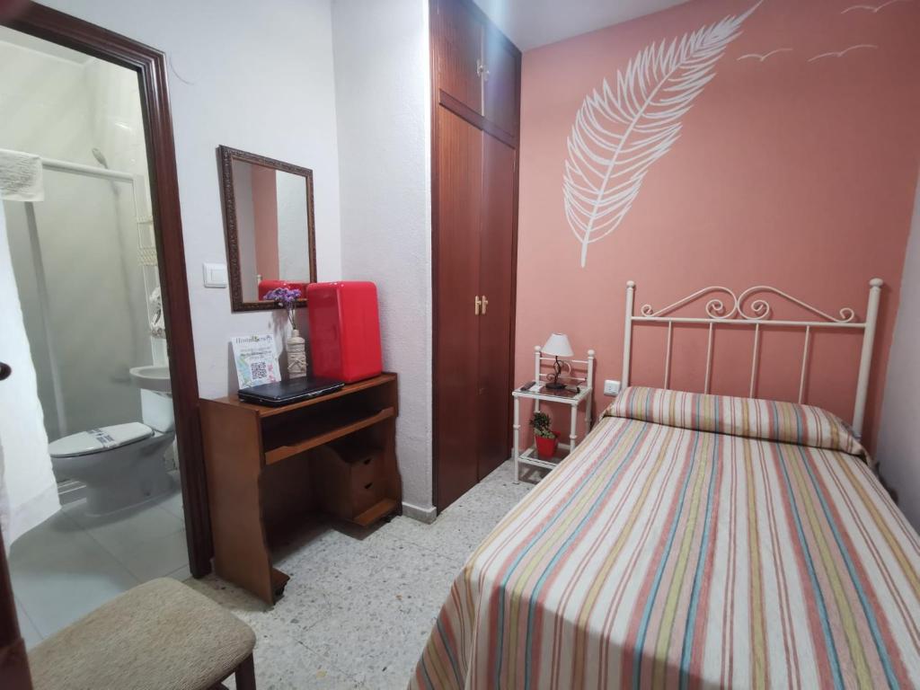 Cama o camas de una habitación en Hostal Senero