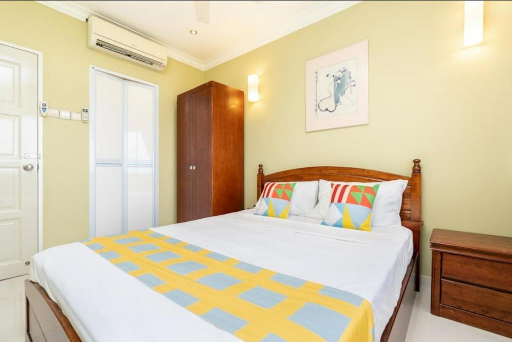 a bedroom with a large bed and a window at VIP Suite Seaview Batu Ferringhi 1003-2 Bedroom in Batu Ferringhi