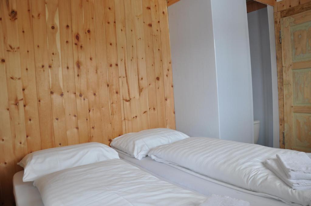 Postel nebo postele na pokoji v ubytování Chalet Speciale - Celerina
