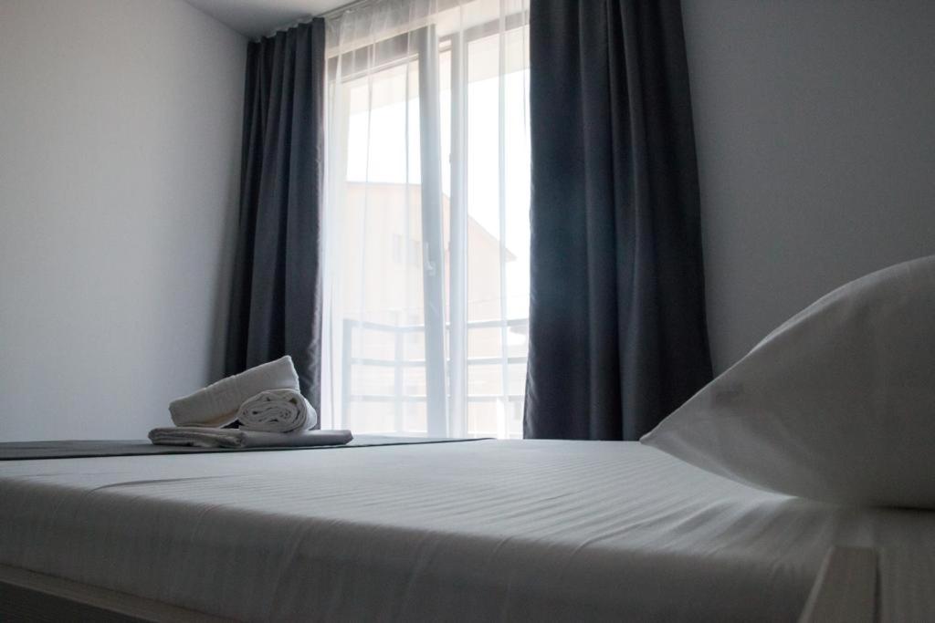 Postel nebo postele na pokoji v ubytování Hotel Premium