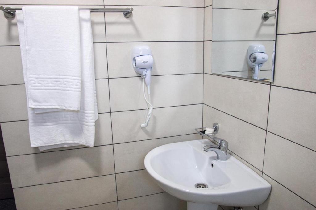 Koupelna v ubytování Hotel Premium