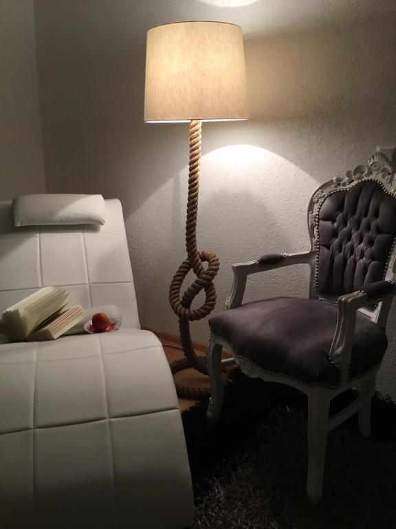 Postel nebo postele na pokoji v ubytování Hotel Zum Berggarten