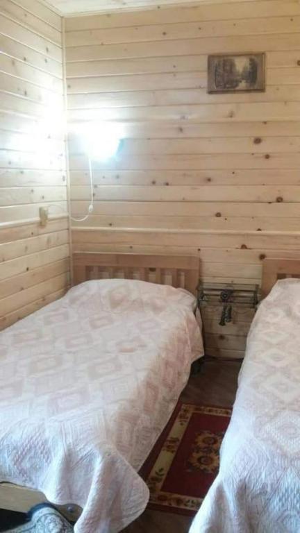Postel nebo postele na pokoji v ubytování Апарт готель,, Червона Рута,,