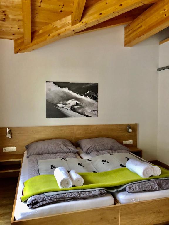 Posteľ alebo postele v izbe v ubytovaní valbel
