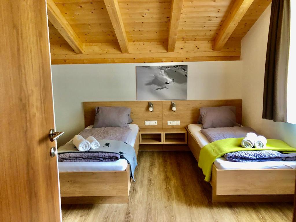 Posteľ alebo postele v izbe v ubytovaní valbel