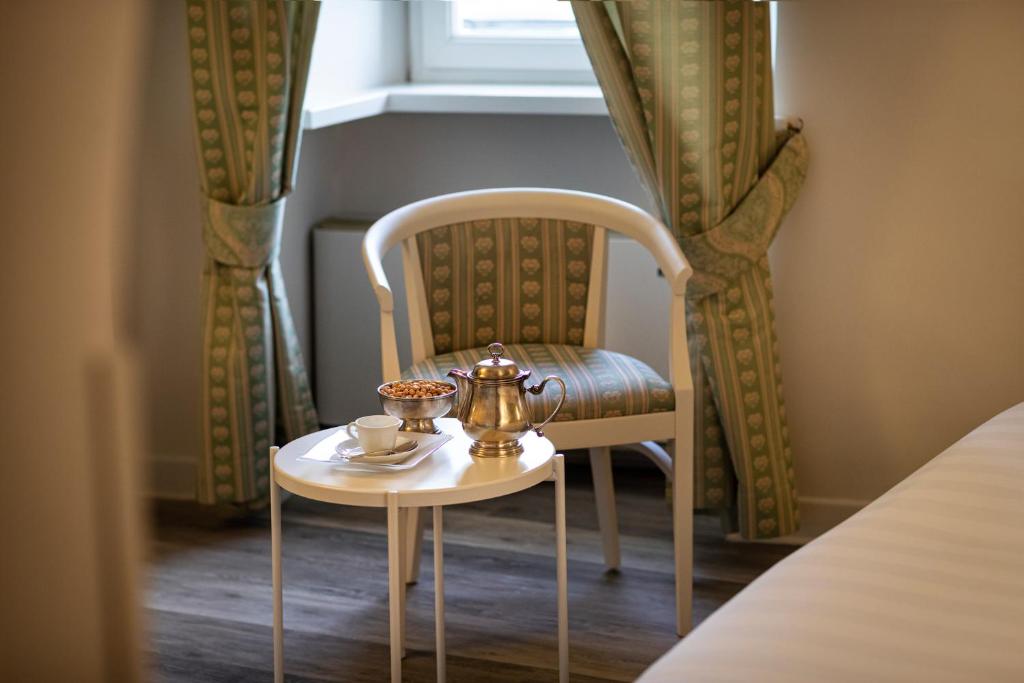 Uma área de estar em Hotel Fontebella