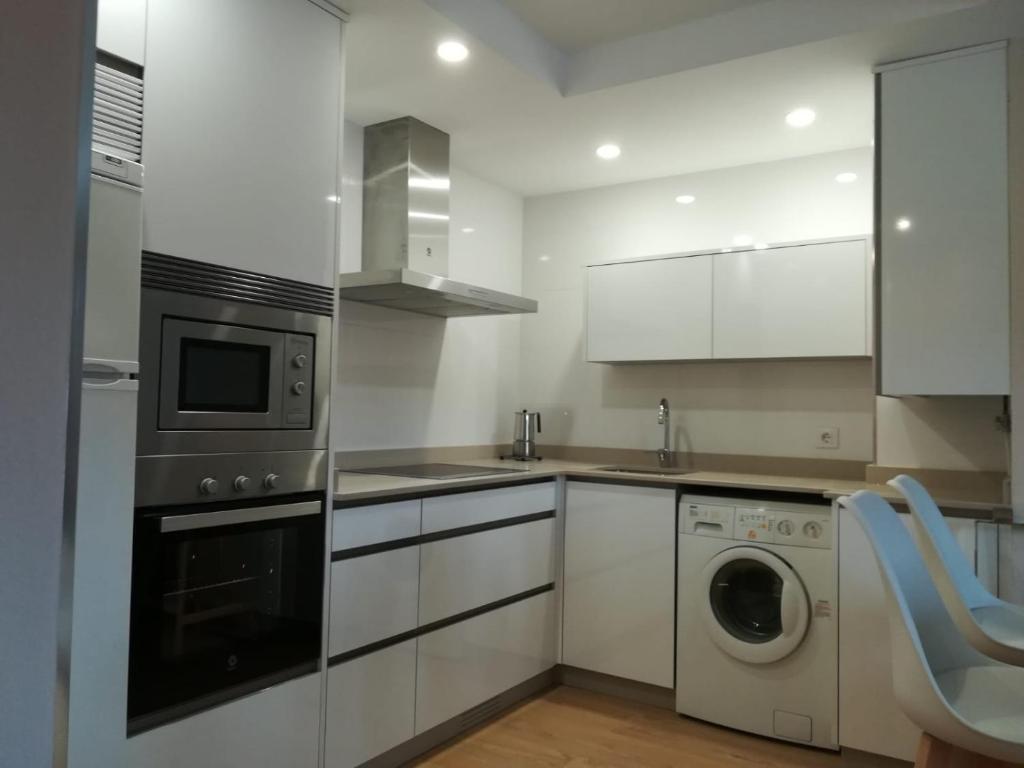 Kuchyň nebo kuchyňský kout v ubytování Apartamento El Manin