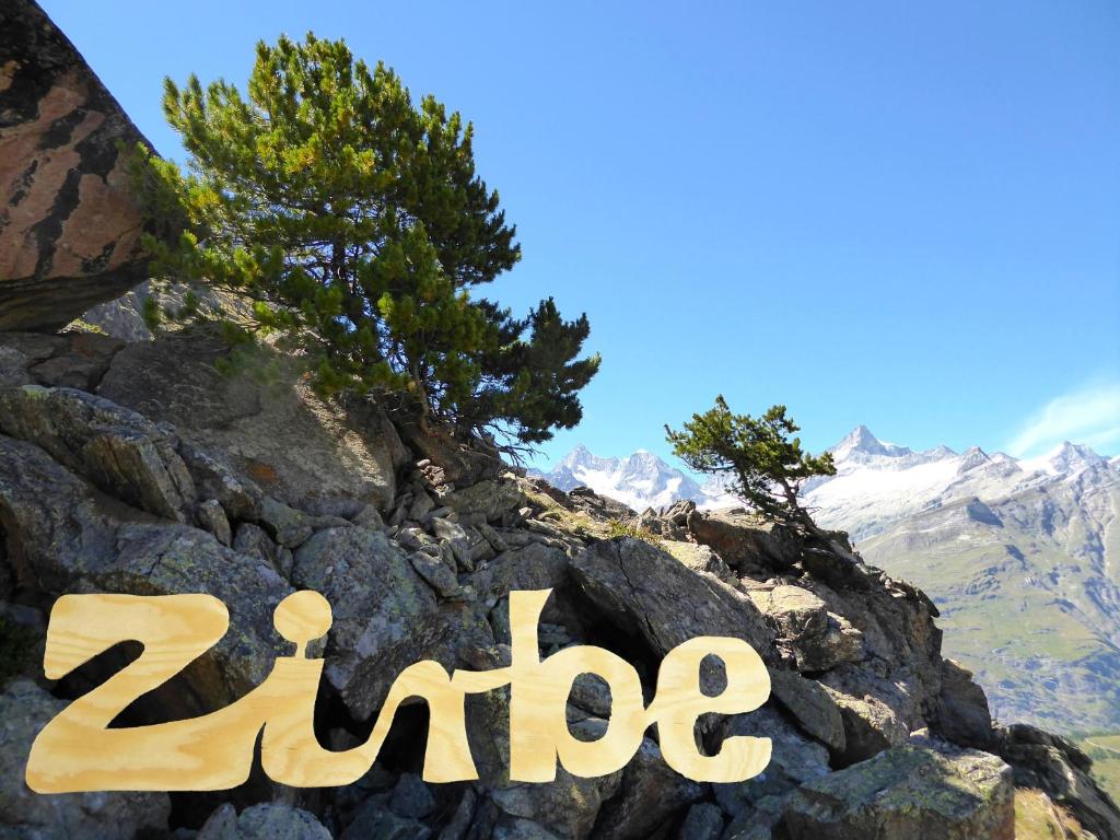 a sign that reads zodiac on a rocky mountain at Zirbe - Bayerischer Hof in Rüdesheim am Rhein