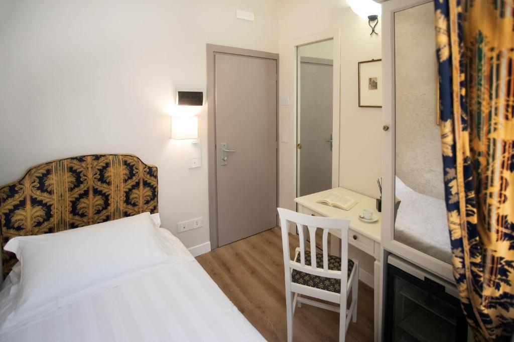 Cama ou camas em um quarto em Hotel Fontebella