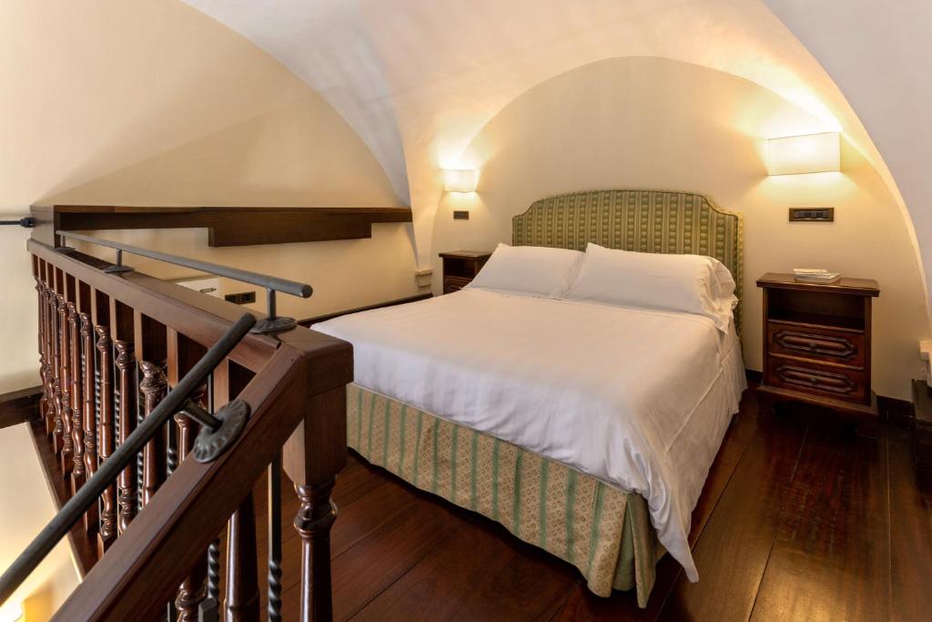 Cama ou camas em um quarto em Hotel Fontebella