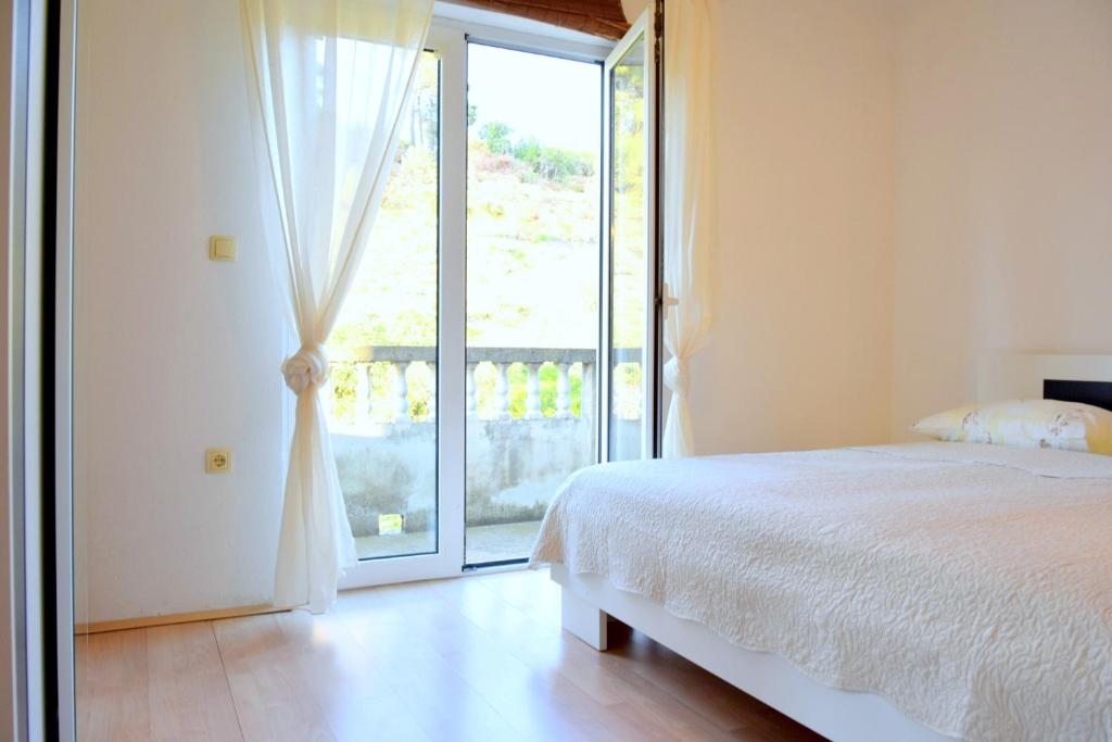 Postel nebo postele na pokoji v ubytování Stel Mar Apartment