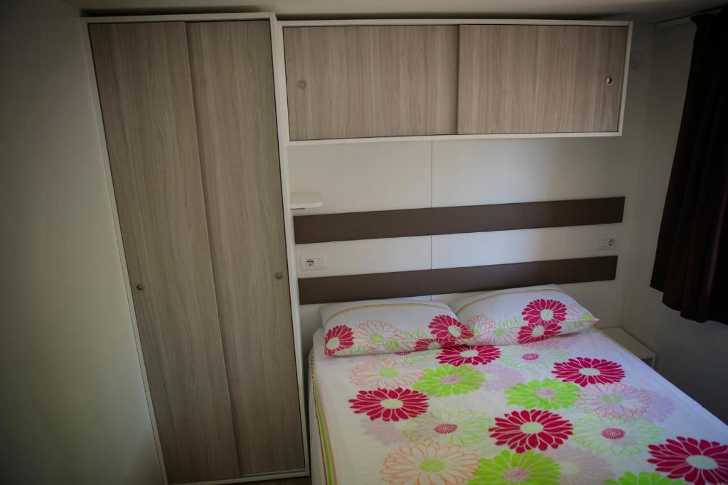 Postel nebo postele na pokoji v ubytování Campeggio Tranquilla