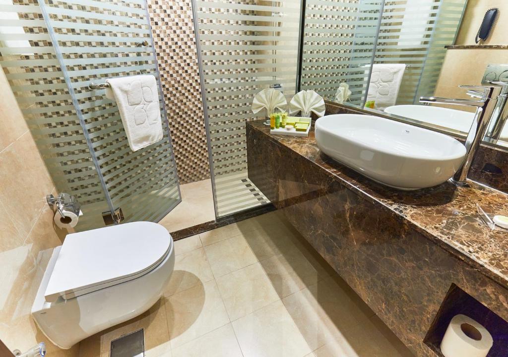 Koupelna v ubytování Rose Plaza Hotel Al Barsha