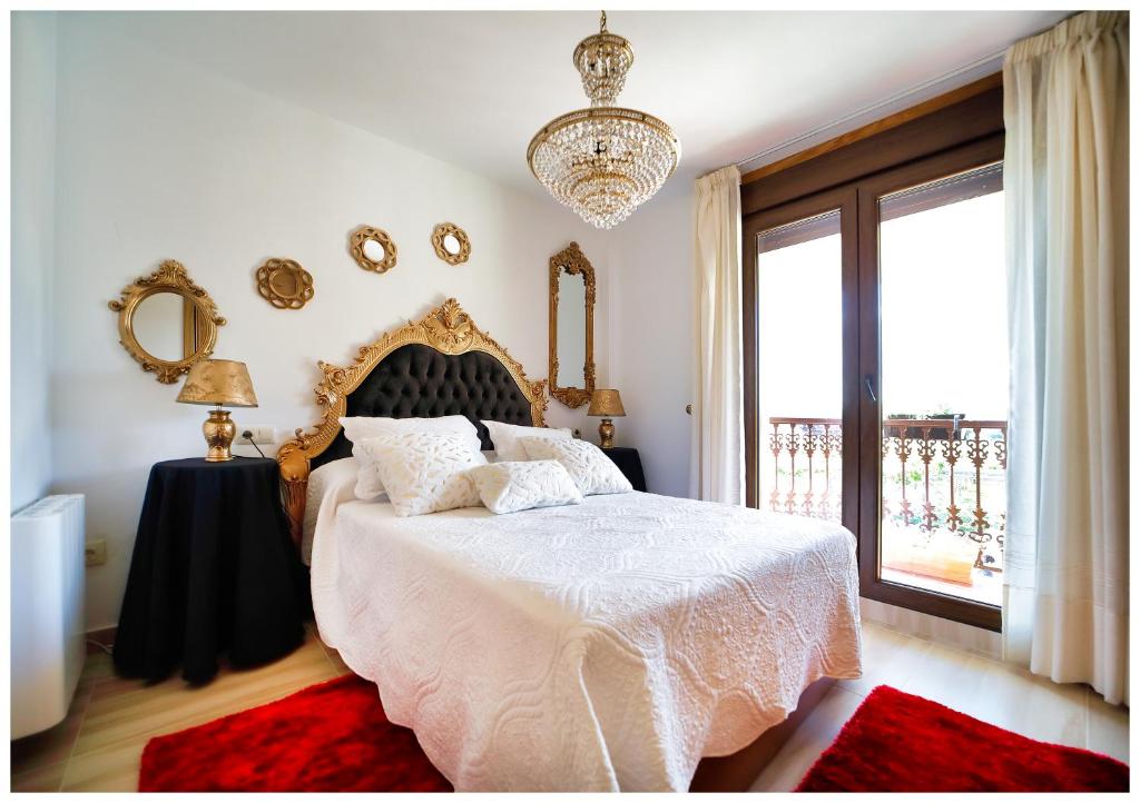 Posteľ alebo postele v izbe v ubytovaní Casa Victoria garden con Jacuzzi y piscina