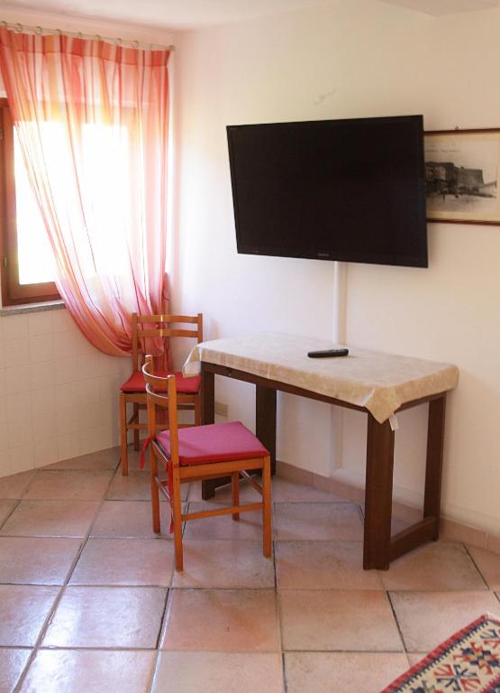 TV a/nebo společenská místnost v ubytování Agriturismo dei girasoli