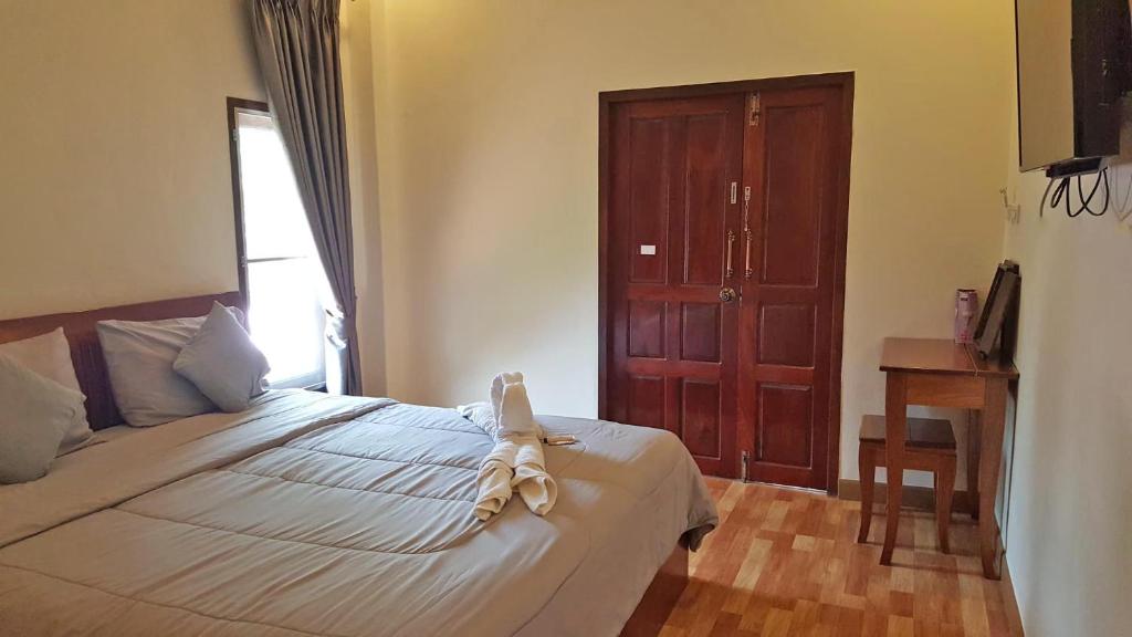Postel nebo postele na pokoji v ubytování Sweetville Home