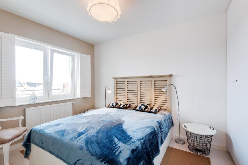 Posteľ alebo postele v izbe v ubytovaní Apartamenty NAVIGATOR-PORT VIEW