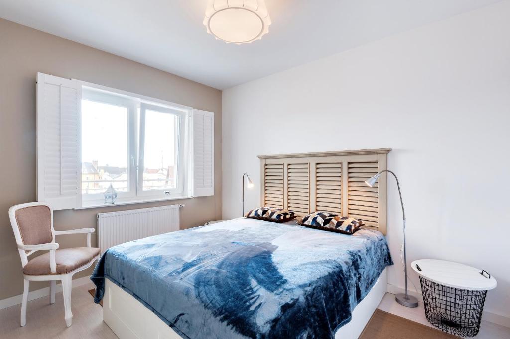 Posteľ alebo postele v izbe v ubytovaní Apartamenty NAVIGATOR-PORT VIEW