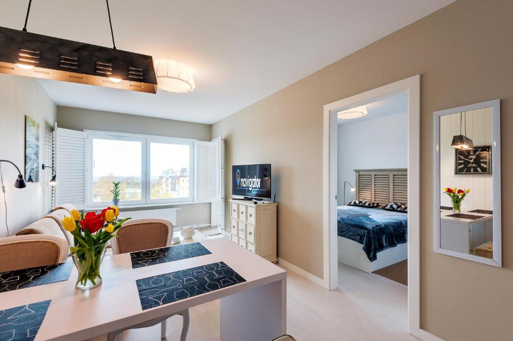 Posteľ alebo postele v izbe v ubytovaní Apartamenty NAVIGATOR-PORT VIEW