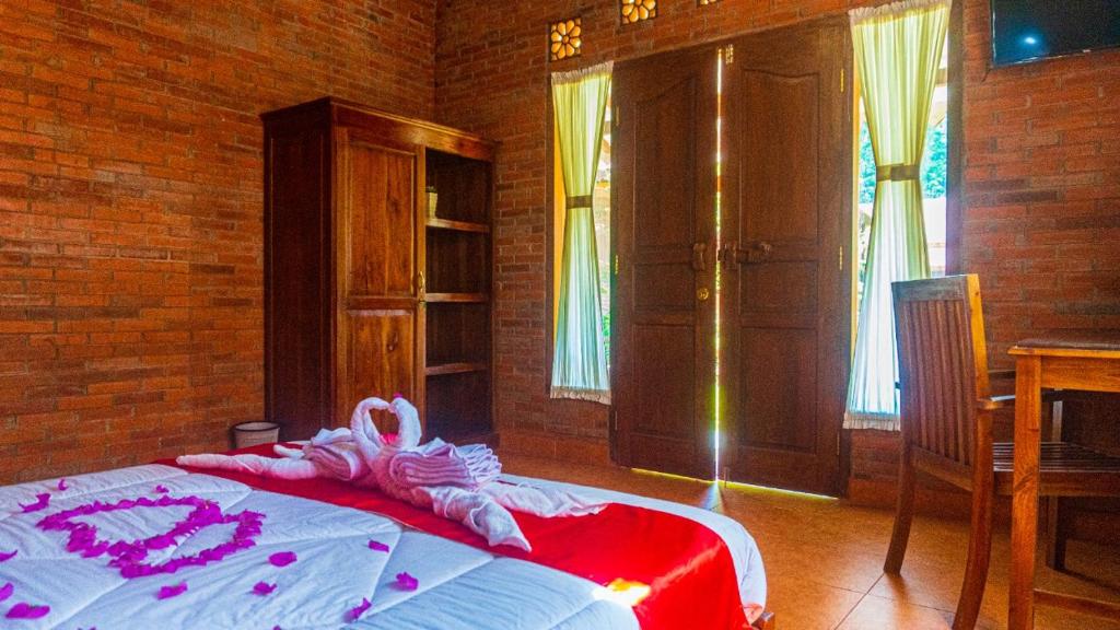 Una cama o camas en una habitación de Villa Mak Cik