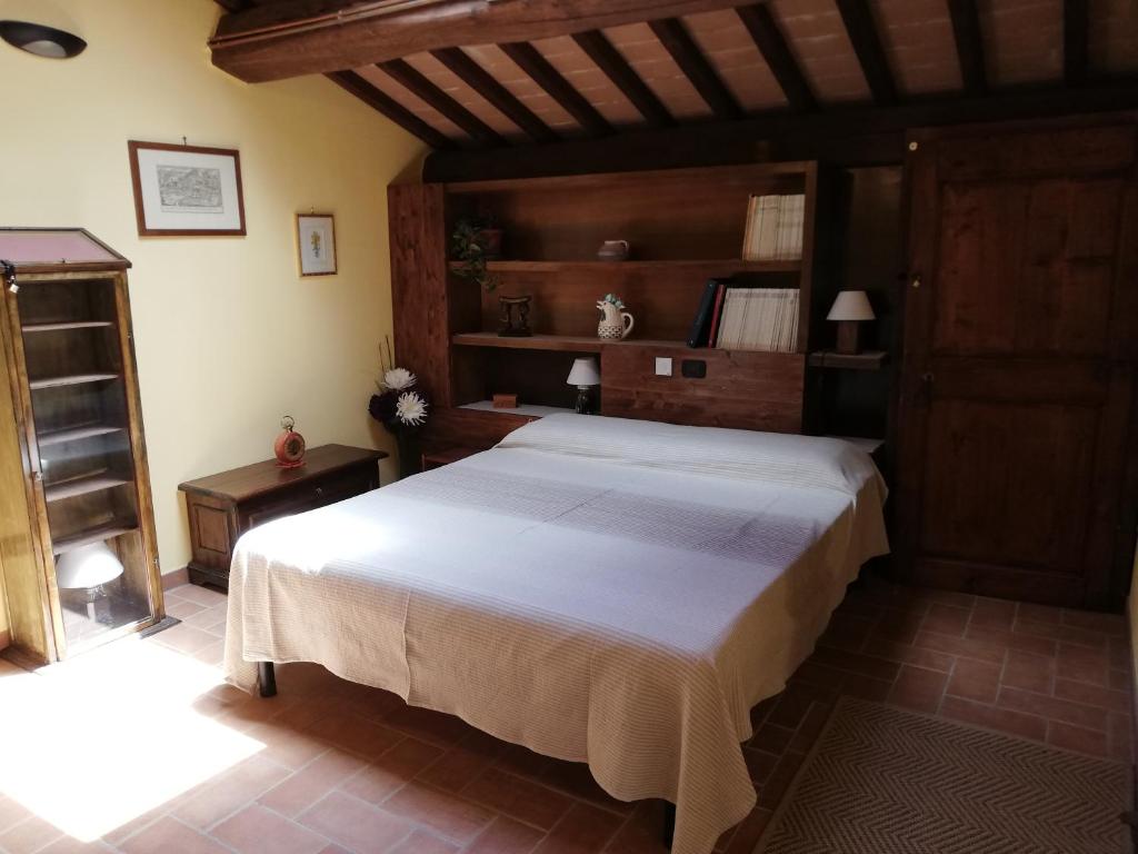Un pat sau paturi într-o cameră la C&C Il Treggio