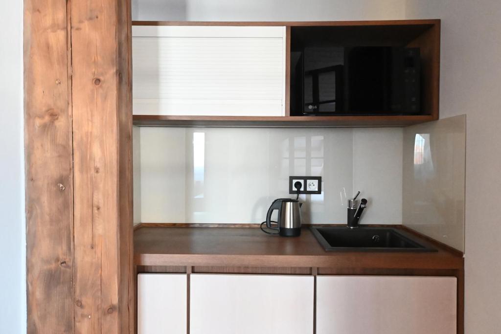 Kuchyň nebo kuchyňský kout v ubytování Apartmány Spessart