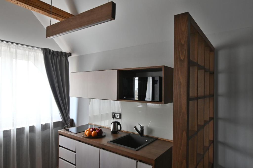 Kuchyň nebo kuchyňský kout v ubytování Apartmány Spessart