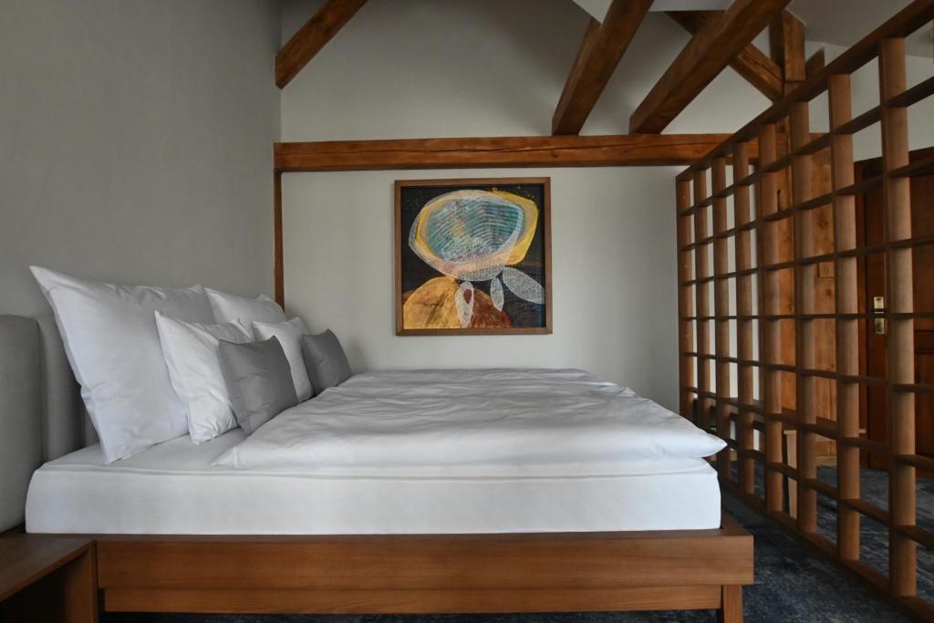 Postel nebo postele na pokoji v ubytování Apartmány Spessart