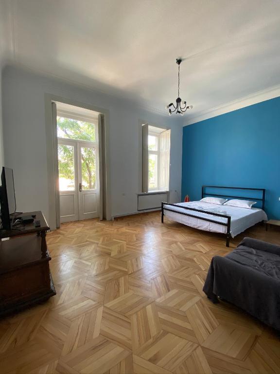 Postel nebo postele na pokoji v ubytování Red Door