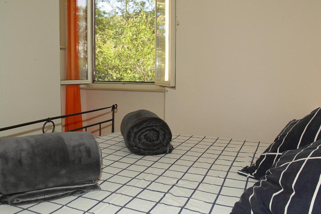 Postel nebo postele na pokoji v ubytování Agriturismo dei girasoli