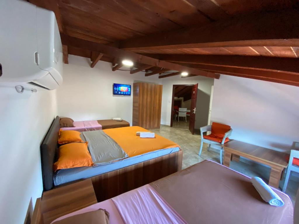 Кровать или кровати в номере Motel Atika