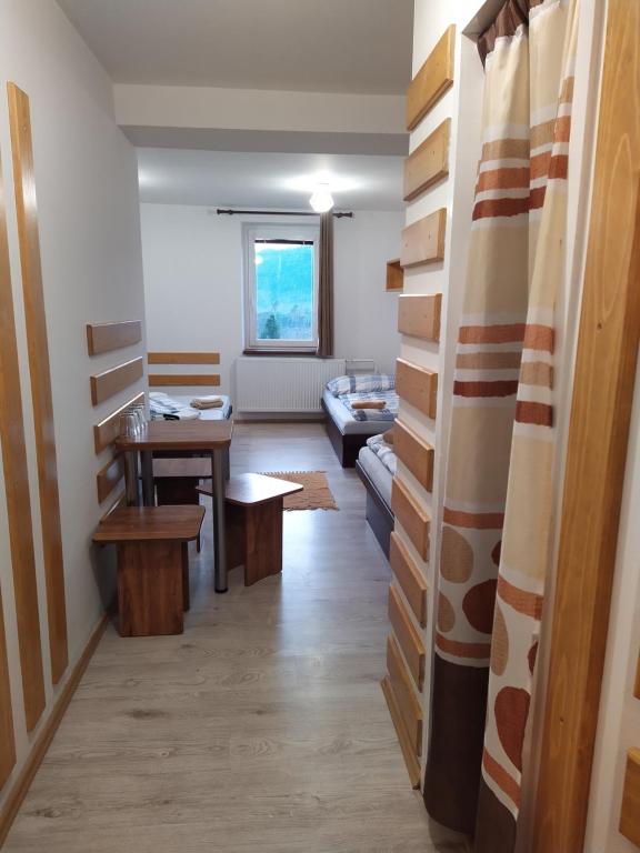Postel nebo postele na pokoji v ubytování Penzion u Marešů