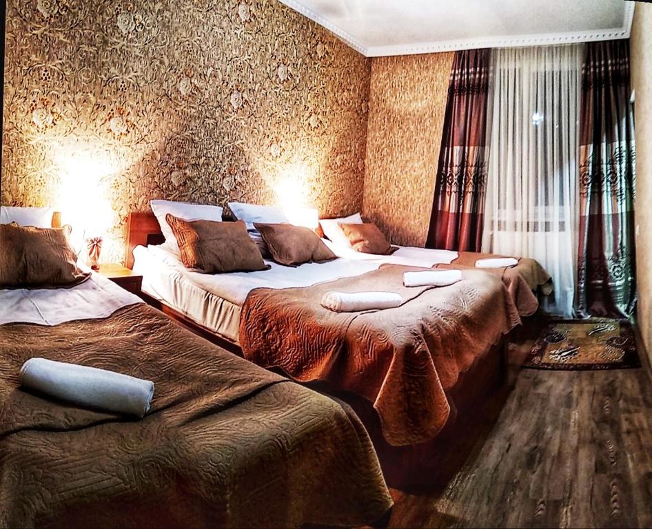 Postel nebo postele na pokoji v ubytování Sophia's GuestHouse