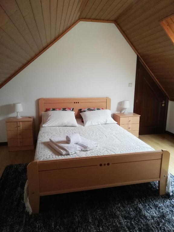 Postel nebo postele na pokoji v ubytování casa cardeal saraiva