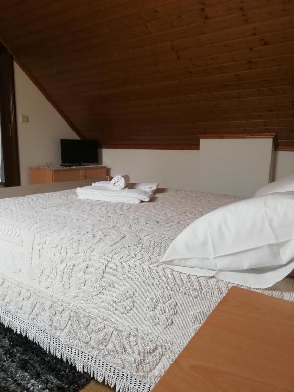 Postel nebo postele na pokoji v ubytování casa cardeal saraiva