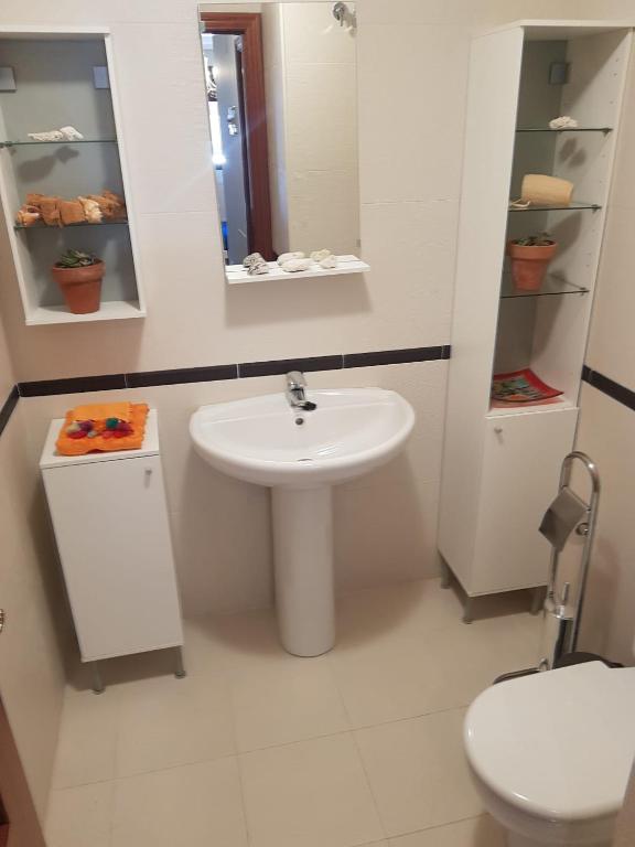 Kúpeľňa v ubytovaní Apartamento en la playa con parking privado