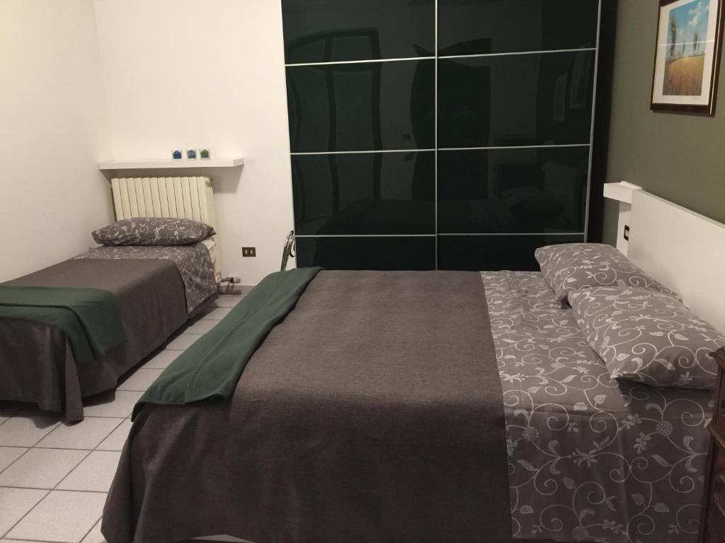 Postel nebo postele na pokoji v ubytování 3per3