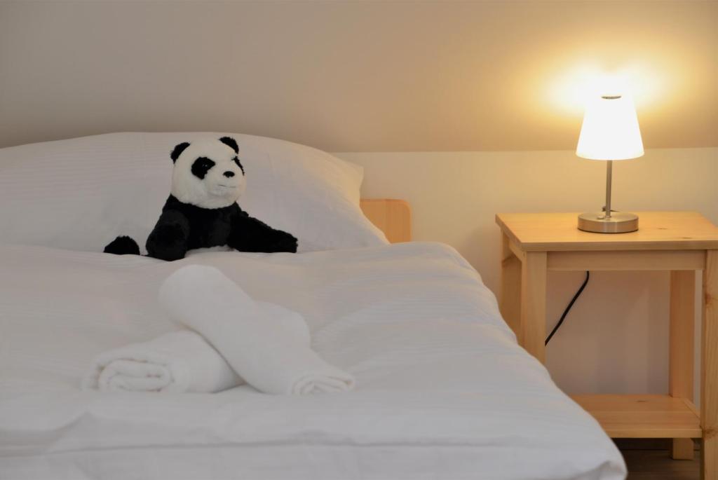 Postel nebo postele na pokoji v ubytování Apartmány Deluxe