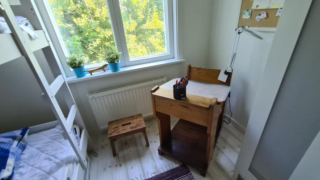 Postel nebo postele na pokoji v ubytování Symaskinshuset Järvsö
