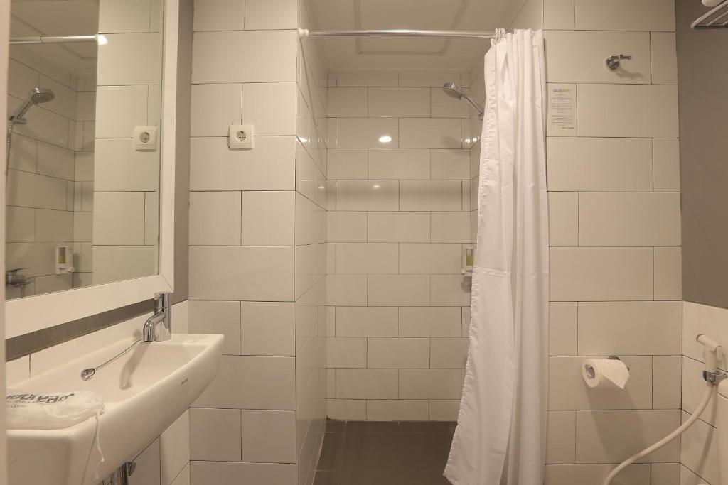 Koupelna v ubytování Hotel Citradream Bandung